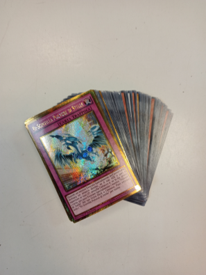 50 Carte Yu-Gi-Oh + 15 Carte Rare   